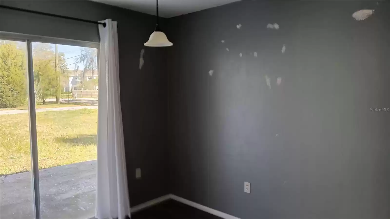 Eat in Kitchen with Sliding Glass doors to the Outside Laundry Room