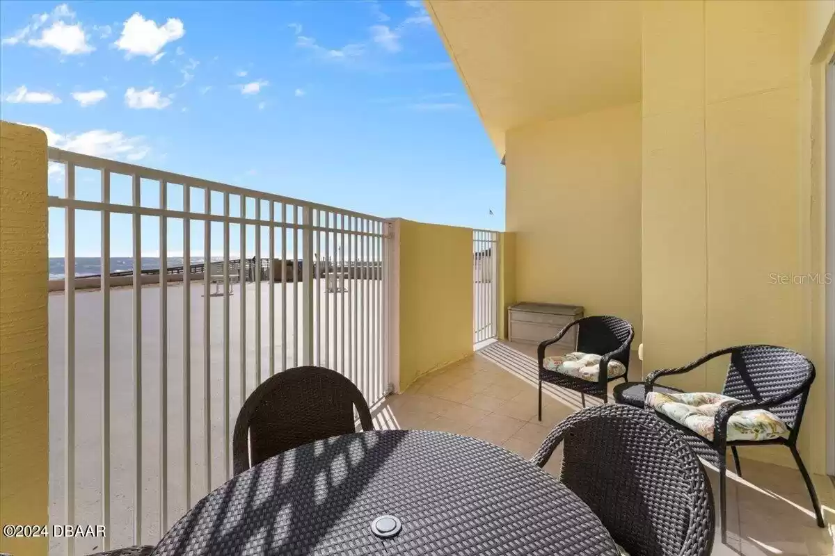 Private patio-access to deck pool and ocean