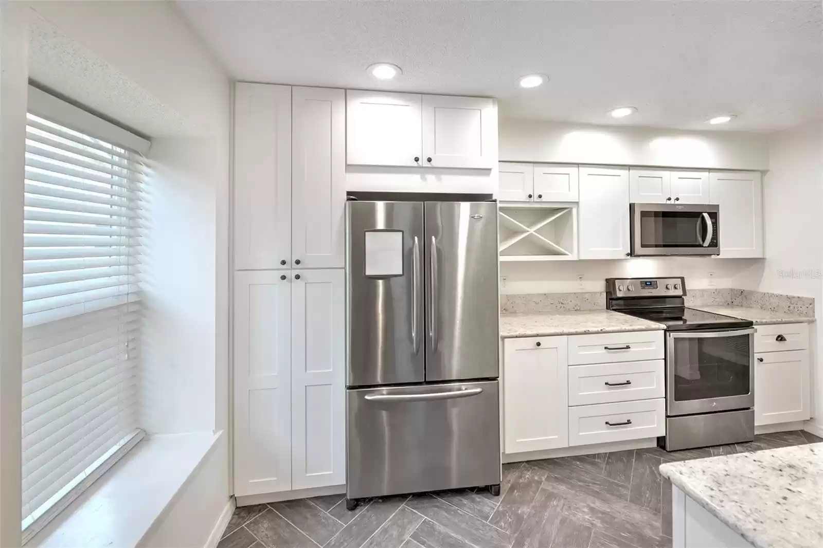 Remodeled kitchen with stainless appliances