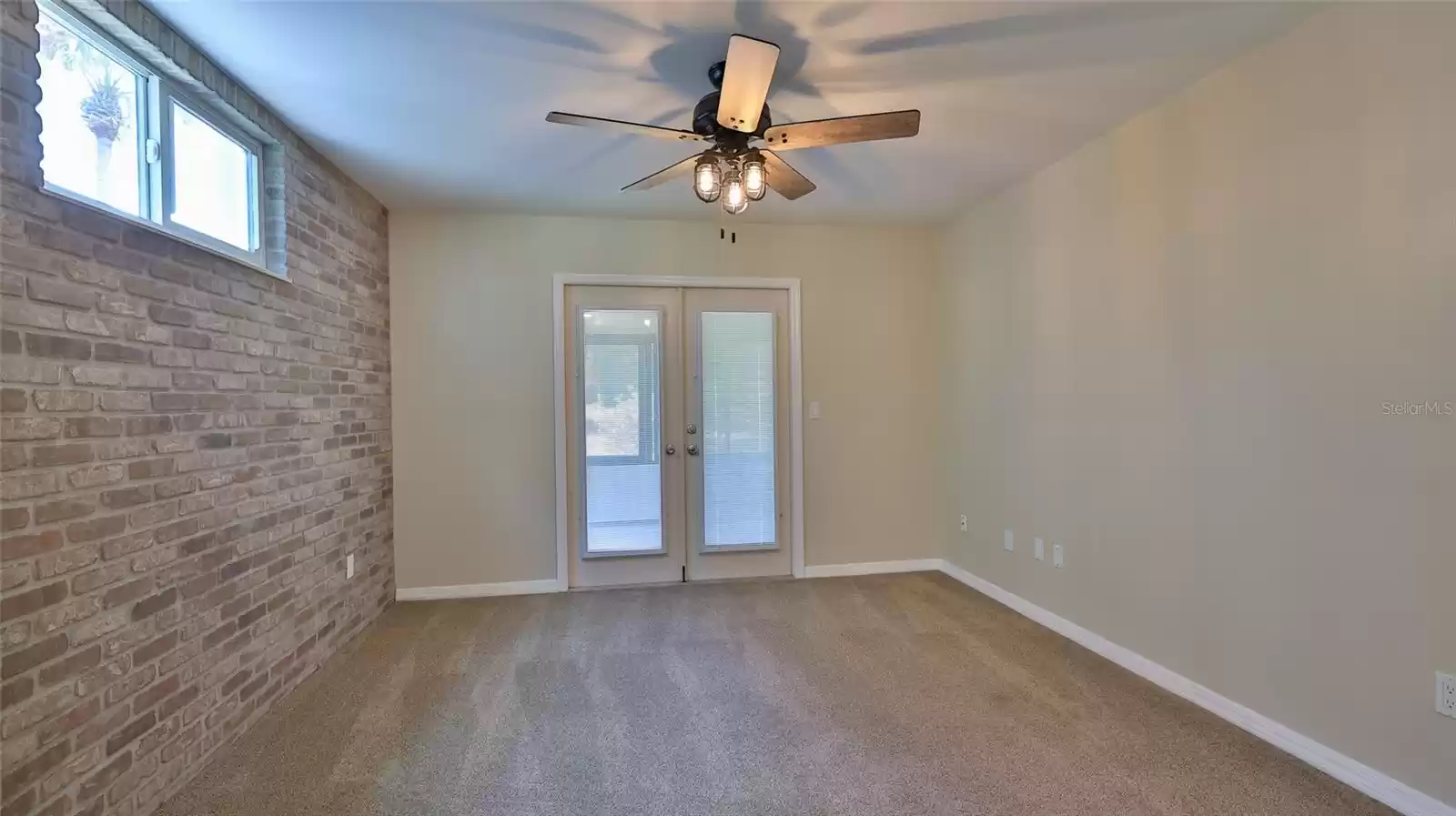 Owner's suite with French doors to lanai