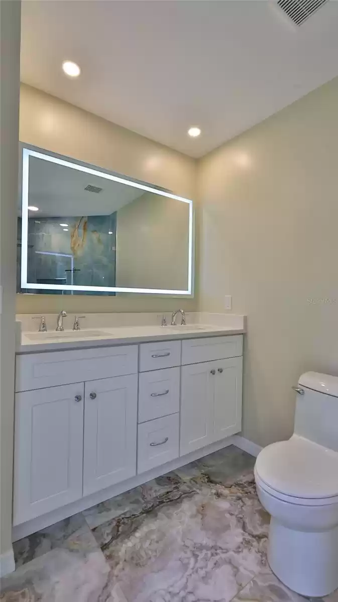 Remodeled owner's suite bath