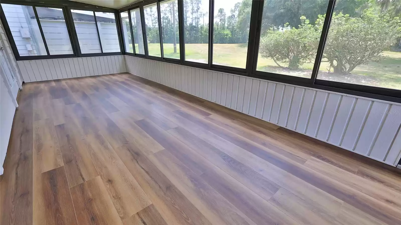 Screened porch with vinyl windows