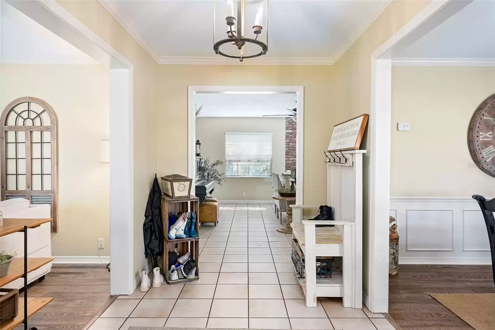 Foyer leads to Living, Dining and Family Rooms