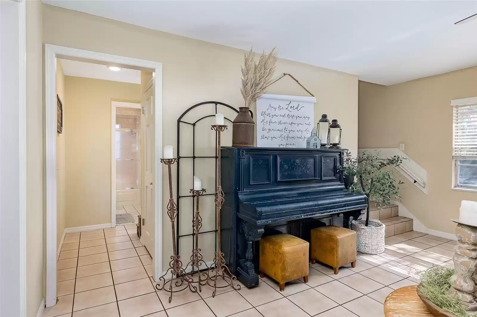 Family Room leads to a Bonus Room/Office and Stairs to the 4 Bedrooms