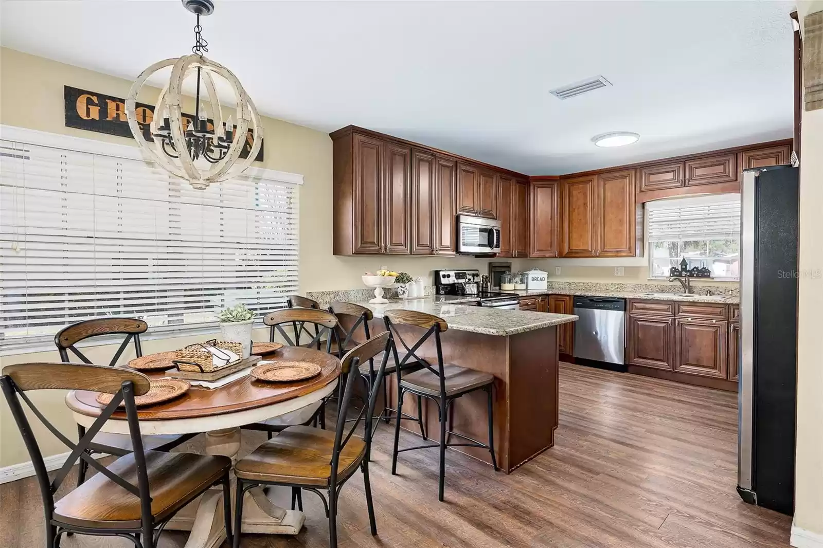 Kitchen with Island seating and Casual Dining