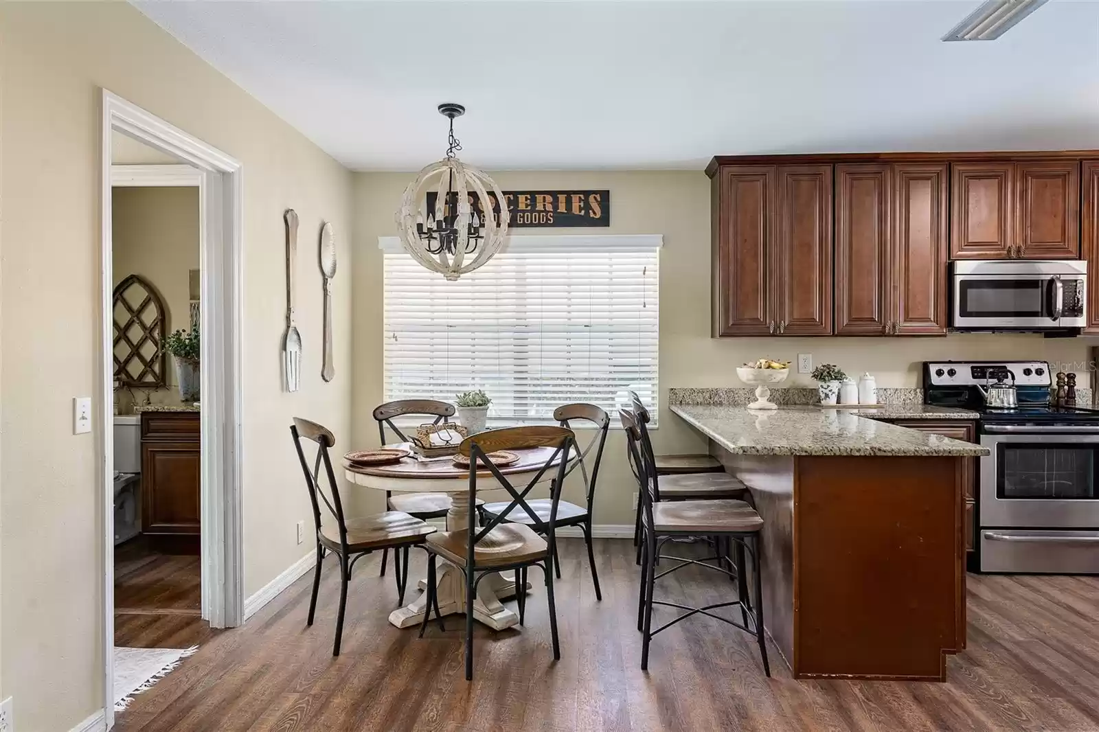 Kitchen opens to Laundry and Half Bathroom