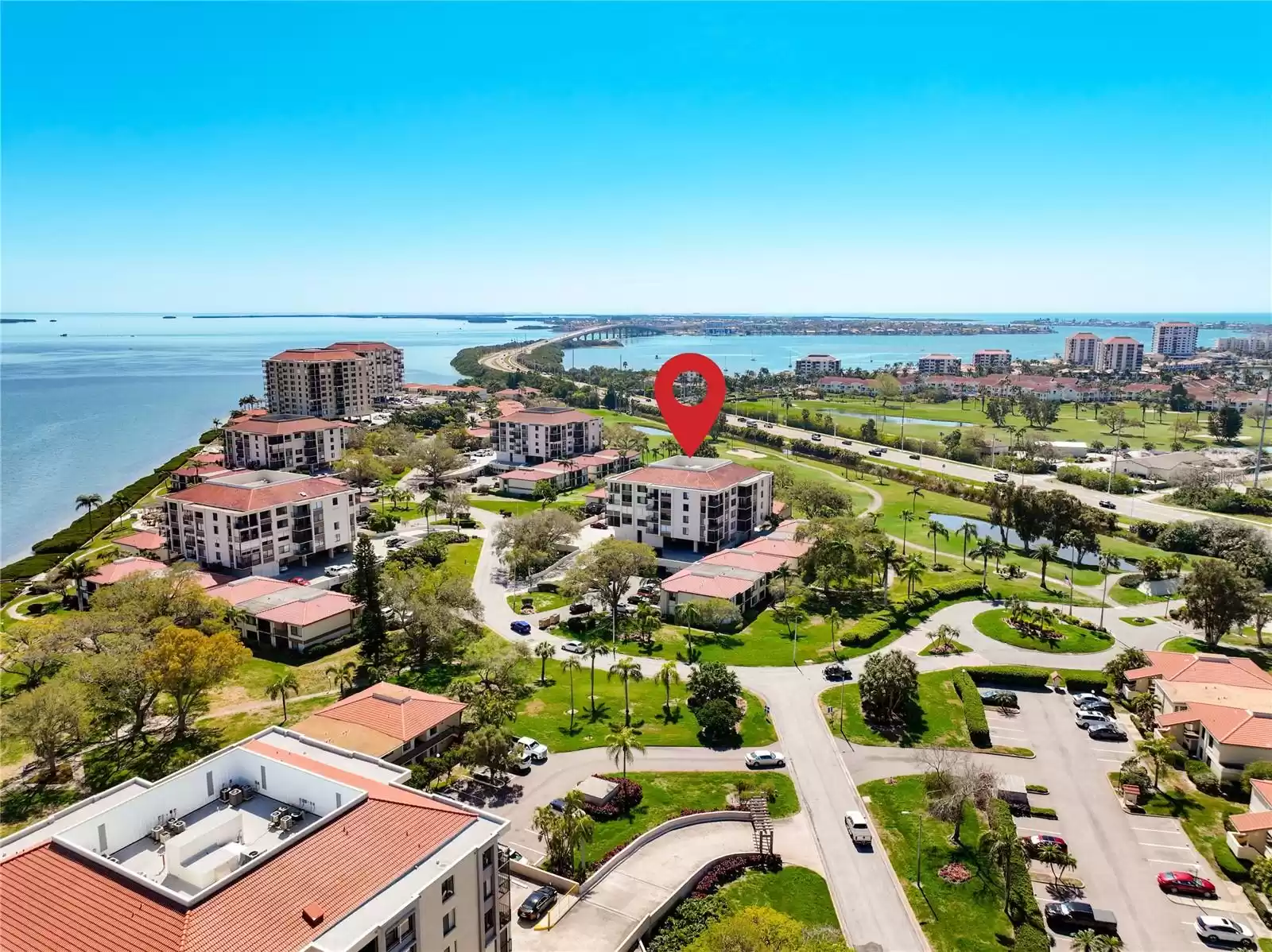 Aerial view looking south towards Tampa Bay, Tierra Verde & Ft Desoto Park. 6219 Palma location under red marker.