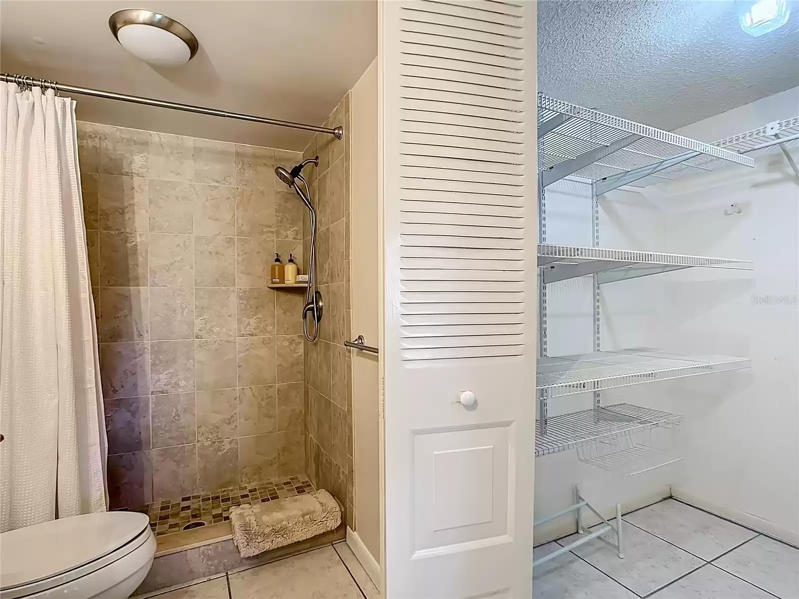 Walk in closet within the master bath