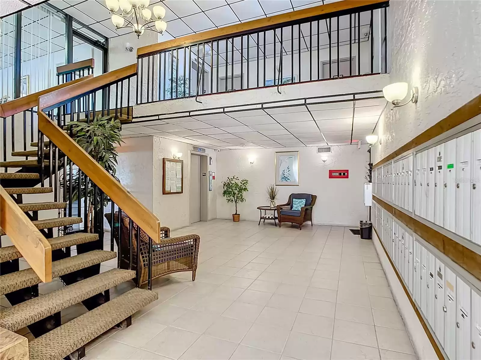 Lobby area of building D. Stairs lead to club room on second level.