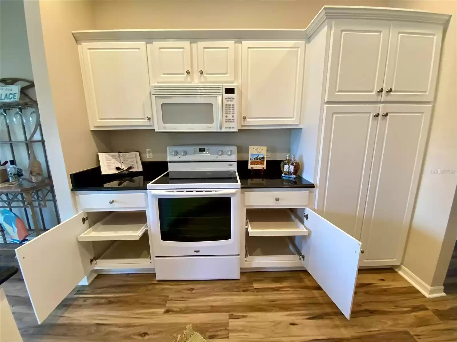 Pull out sliding shelves in cabinetry