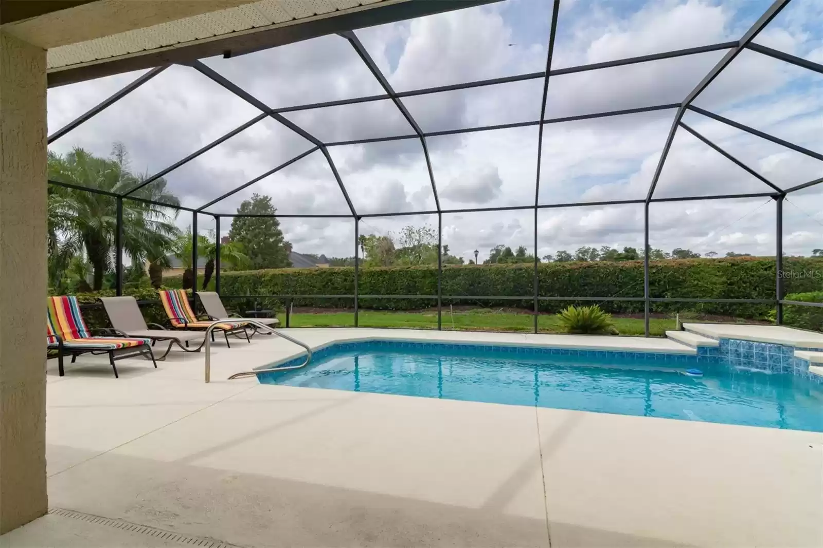 Large pool with waterfall feature