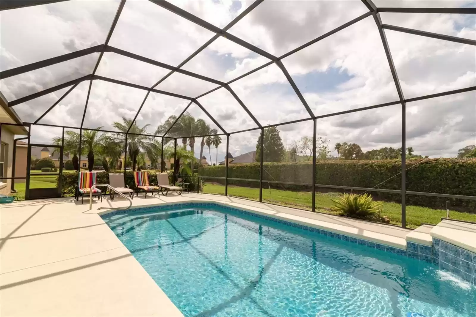 12x24 ft inground pool with waterfall feature