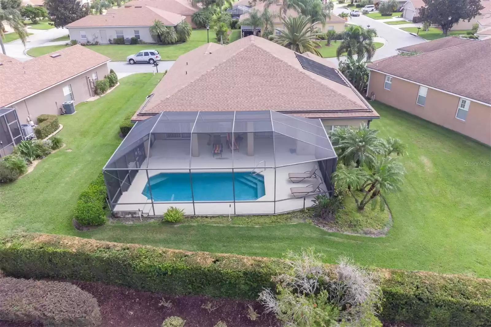 Aerial view of home and pool