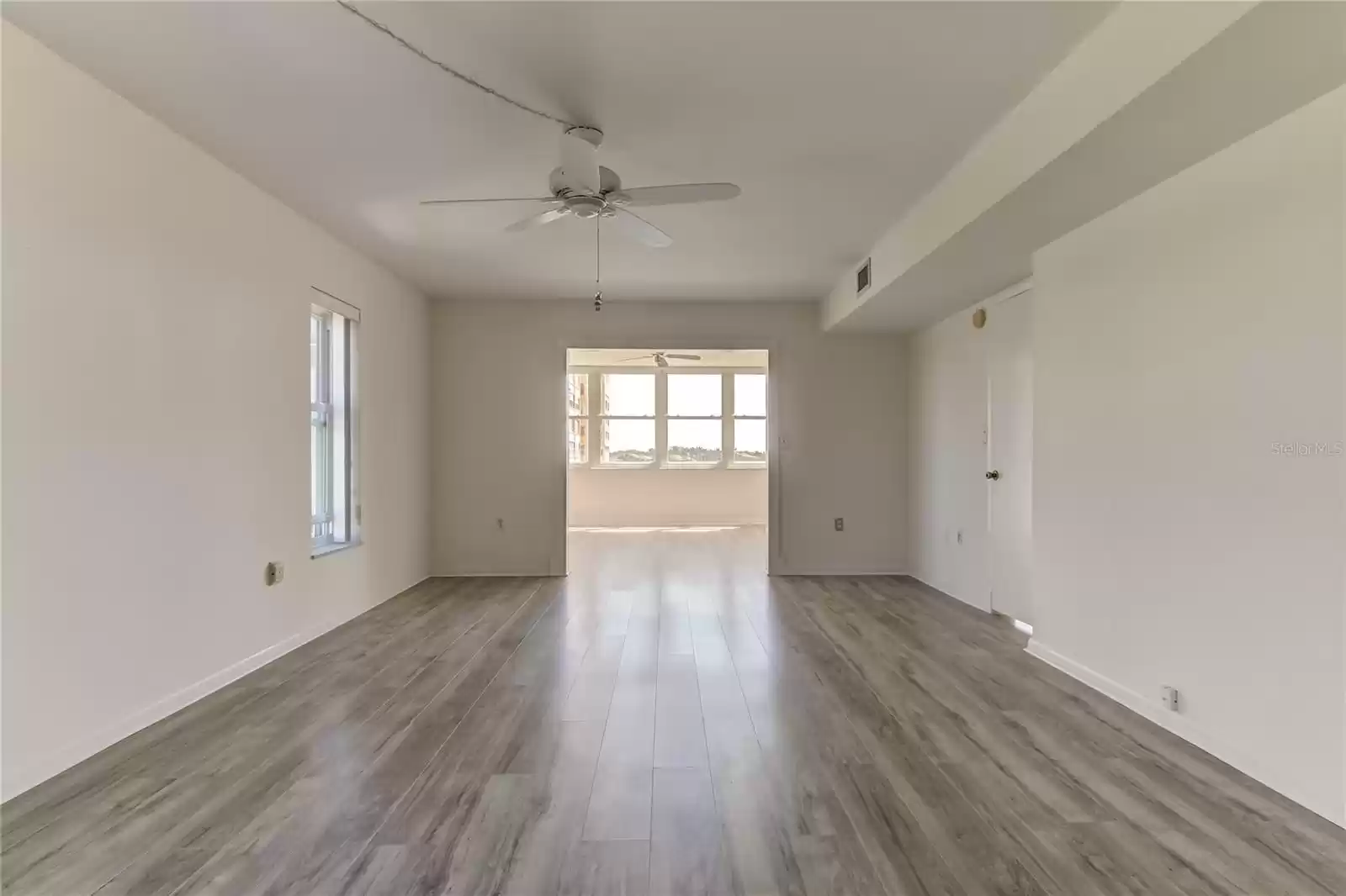 Master Bedroom through archway to Bonus Room