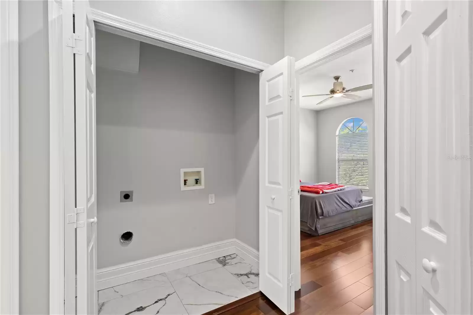 Laundry Closet next to primary bedroom and second bedroom suite