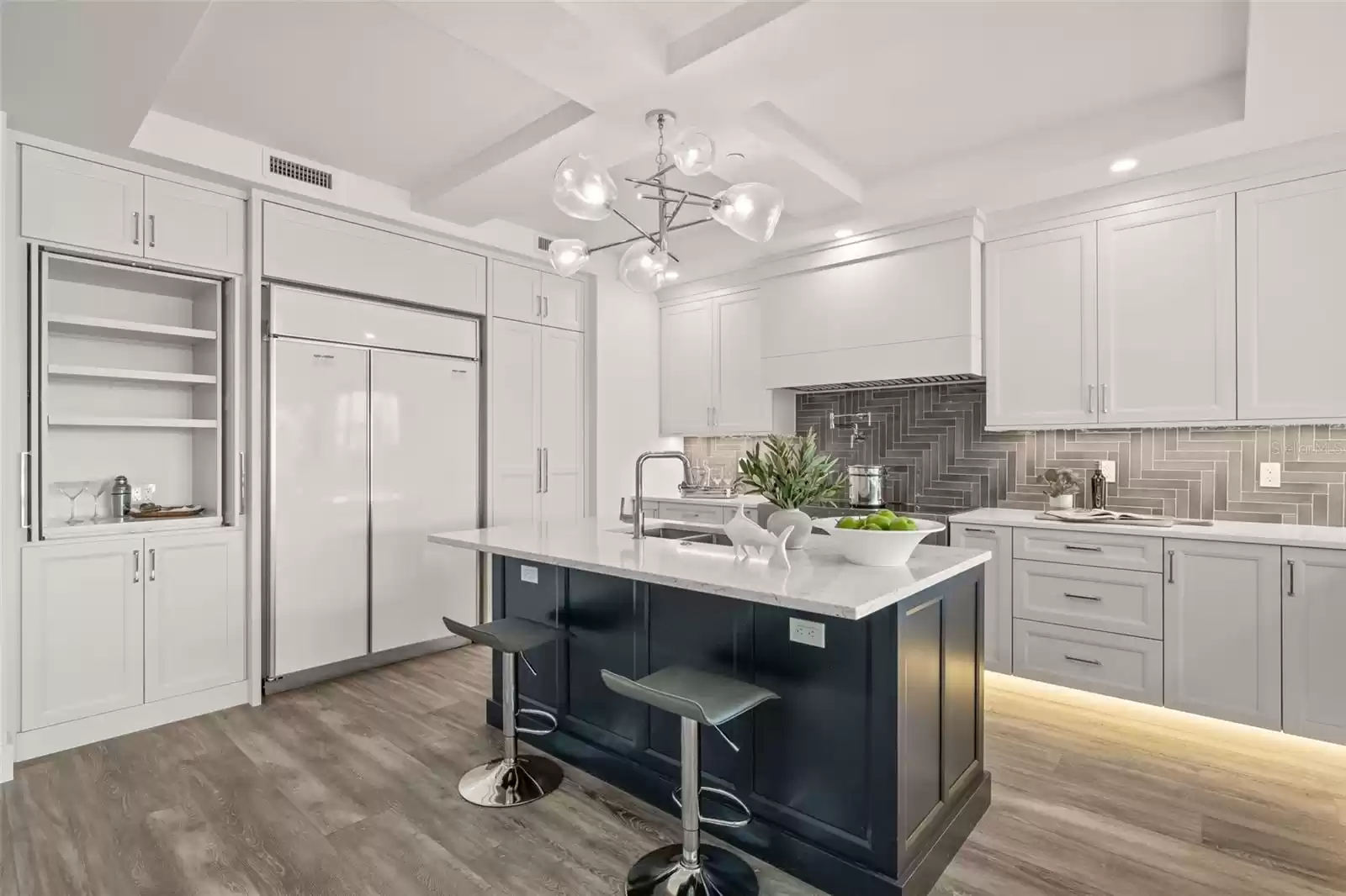 Here, you can see the coffee bar station. The refrigerator will be paneled to match the cabinetry