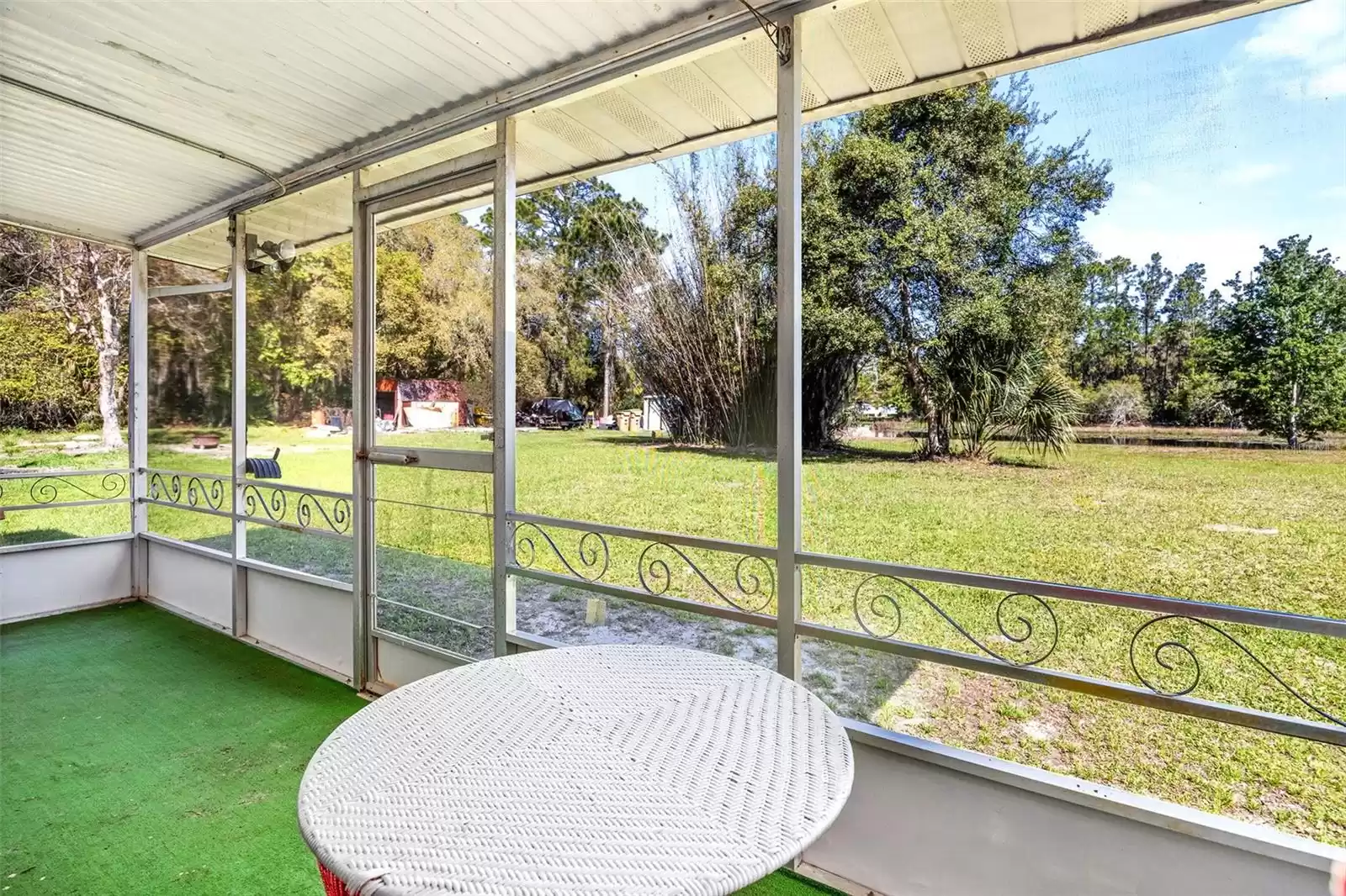 Screened in back porch on 1973 home.