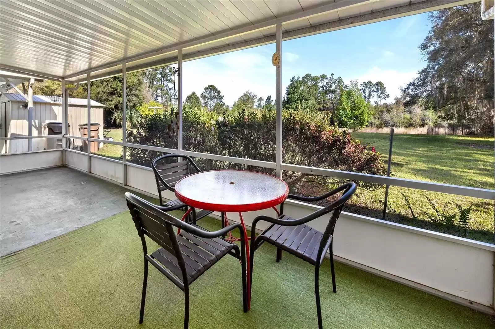 Screened in back porch, 1971 home.