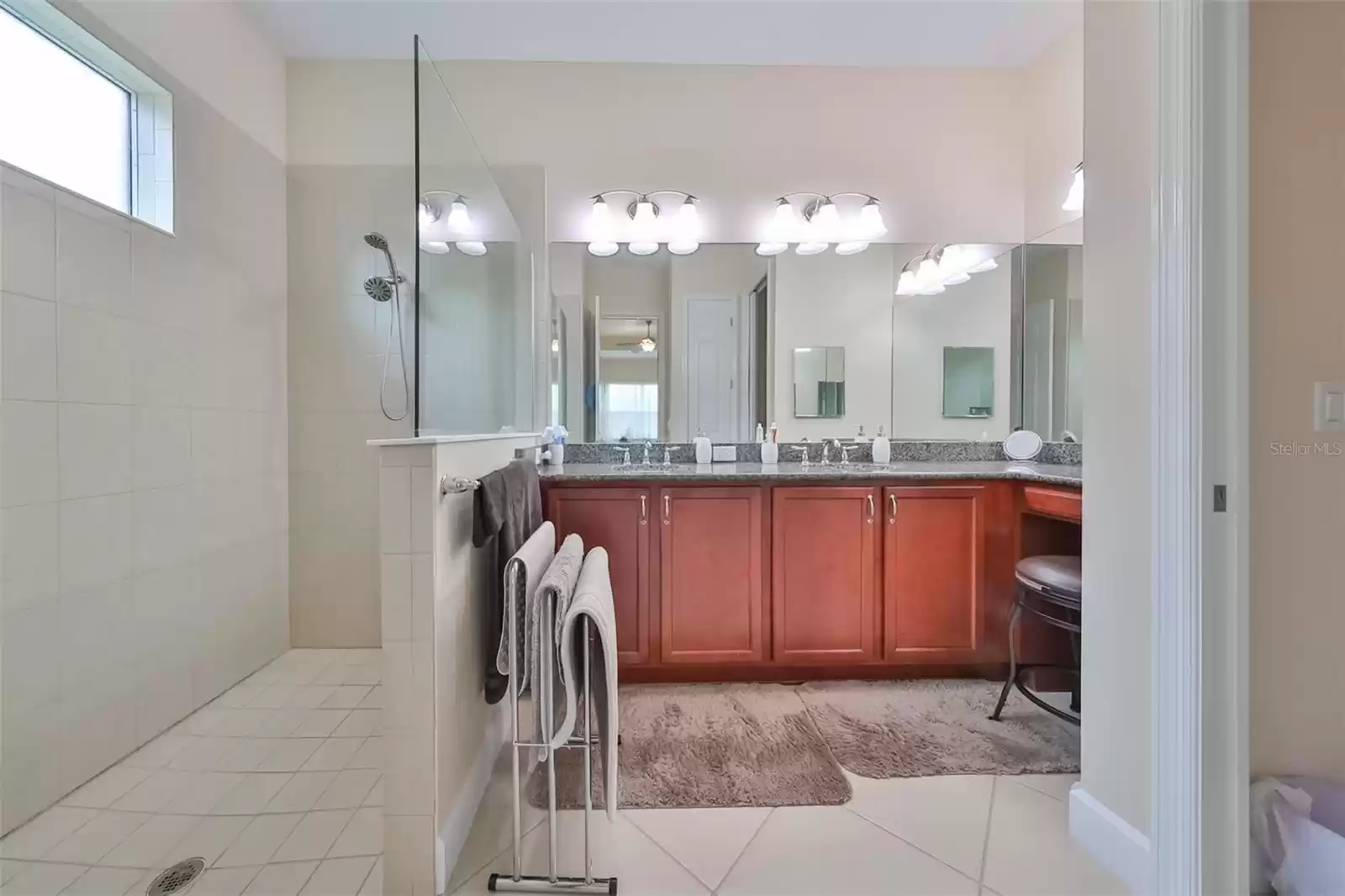 Ensuite Bathroom is stunning with red oak cabinets, large walk in shower, bright lights, granite counter tops and a private water closet.