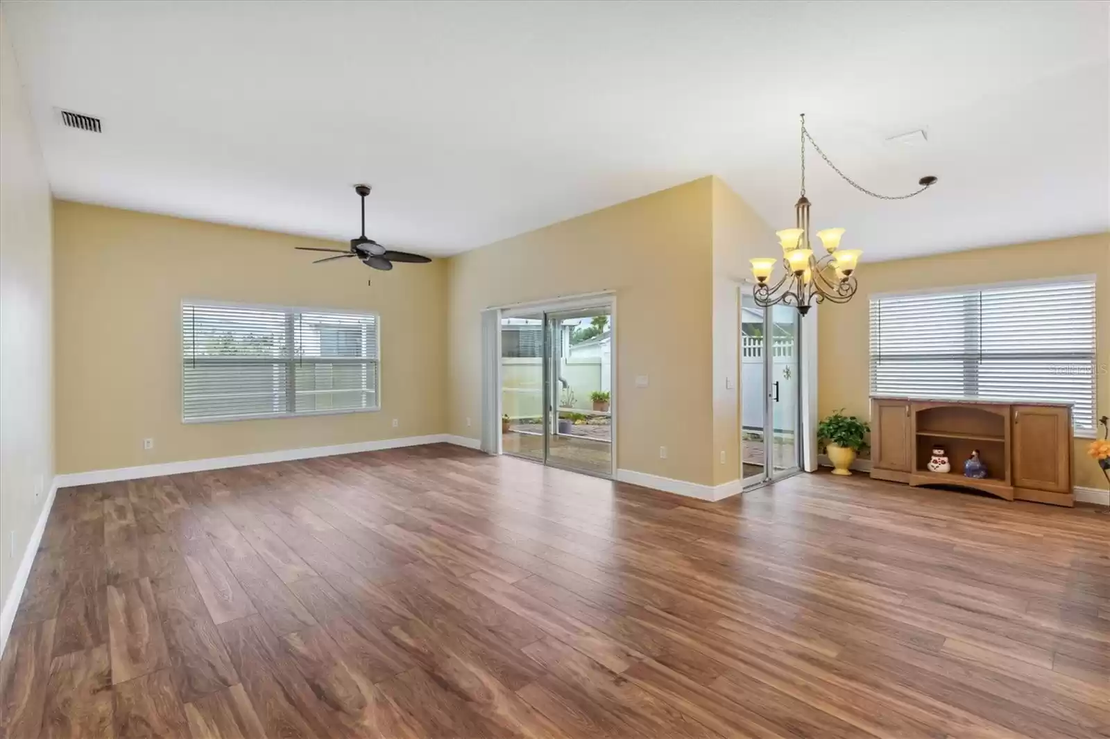 BEAUTIFUL NEW FLOORING AND BASEBOARDS FOR EASY CLEANING