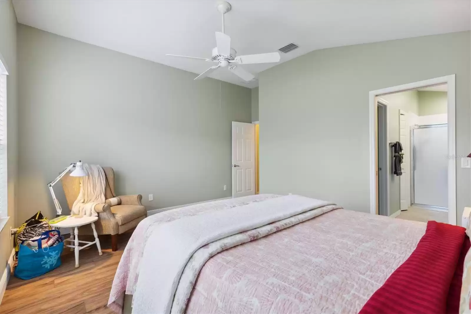 LARGE MASTER BEDROOM WITH ENGINEERED HARDWOOD FLOORING