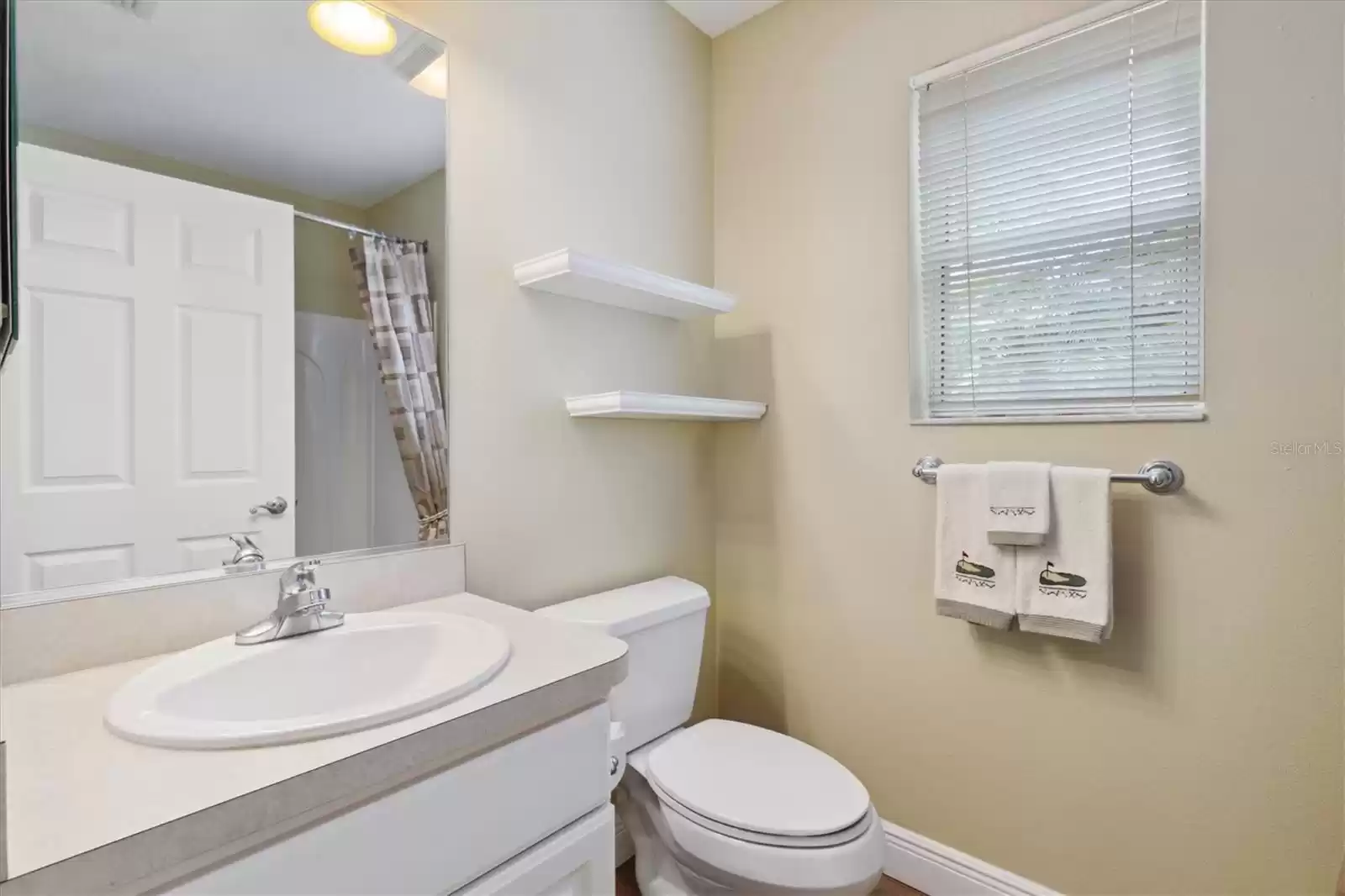 GUEST BATHROOM WITH TUB AND SHOWER