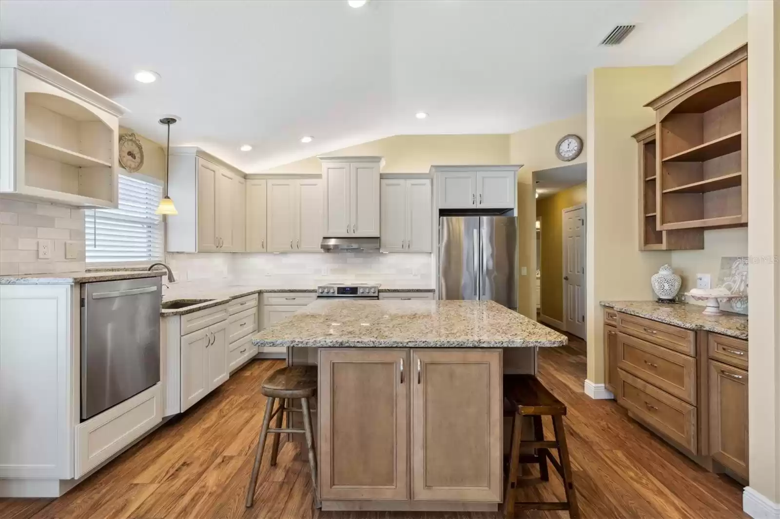 GOURMET KITCHEN   LIGHT CABINETS ARE CANVAS SUEDE COLOR, AND DARKER CABINETS ARE BARLEY SUEDE COLOR