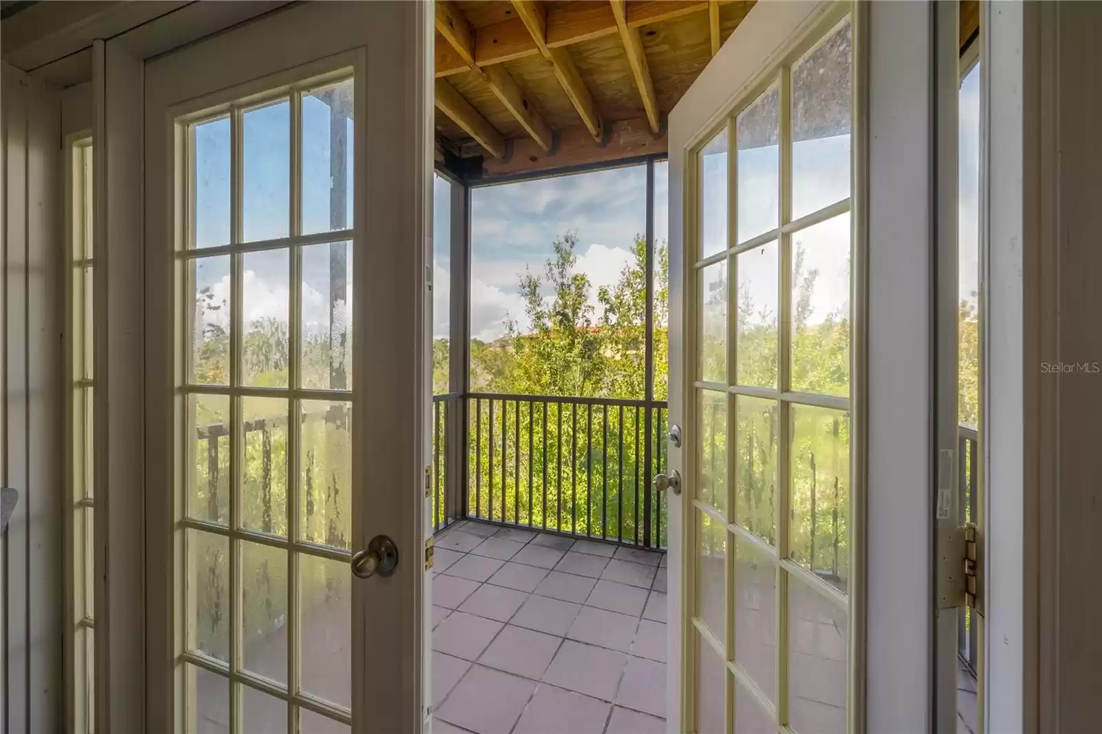 French doors opening to the balcony