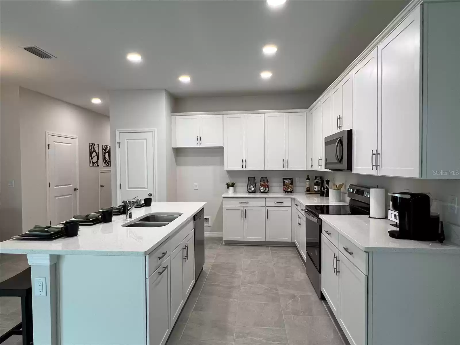 Kitchen with Big Island and Lots of Cabinet Space! (photo of model home)