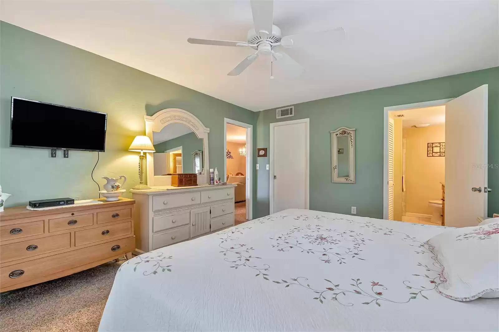 Master bedroom with pocket entry door and closet door