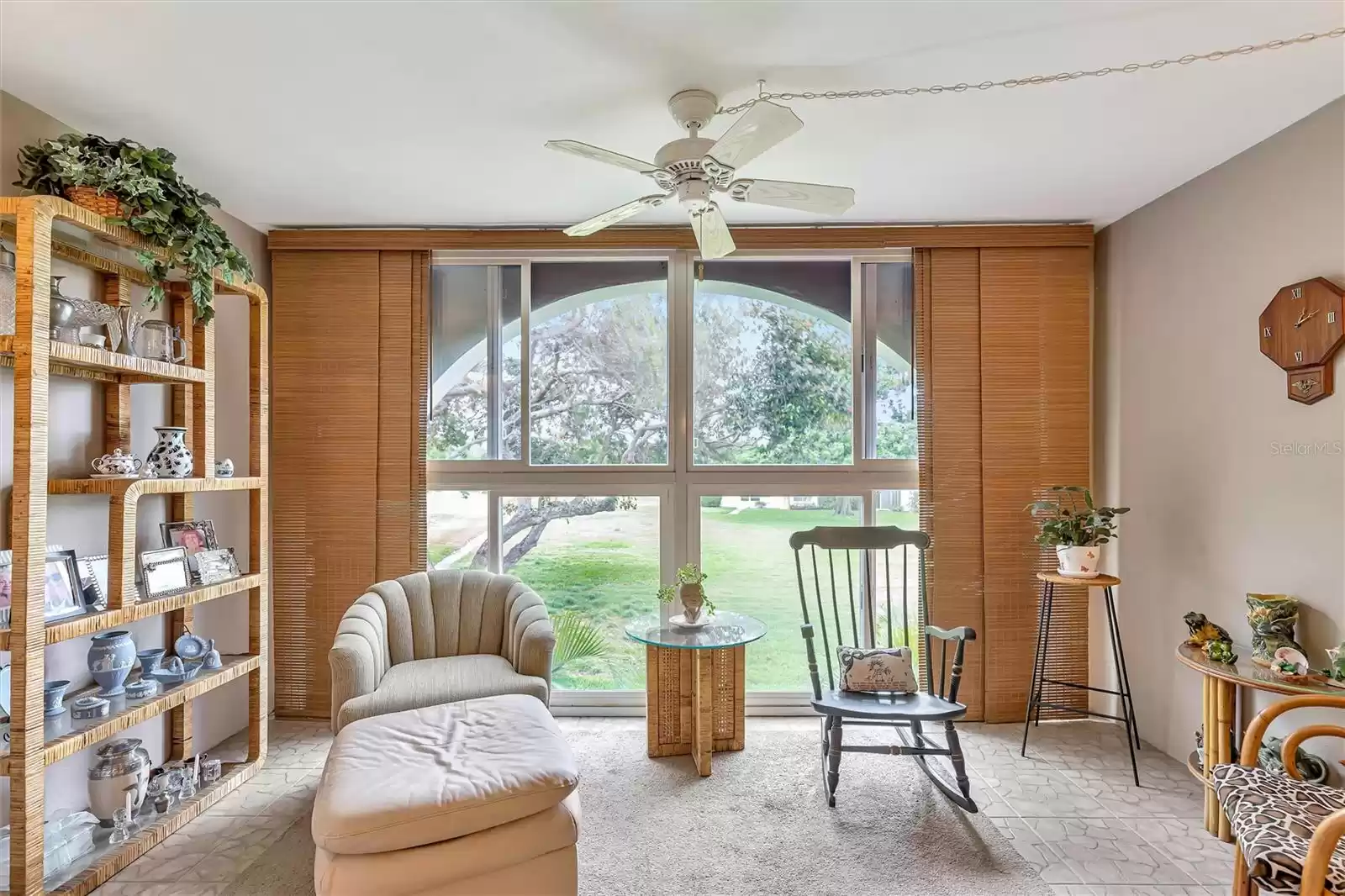 Florida room with large windows to let in the breeze