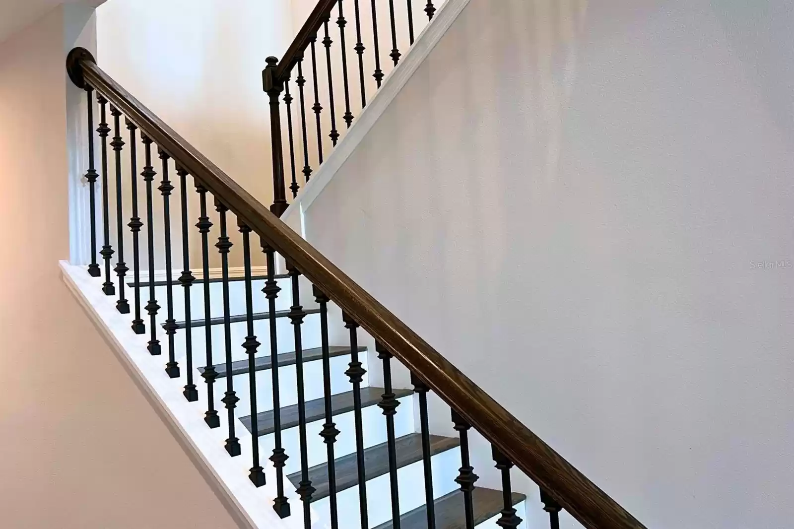 Upgraded Iron Spindles and Dark Wood Handrails