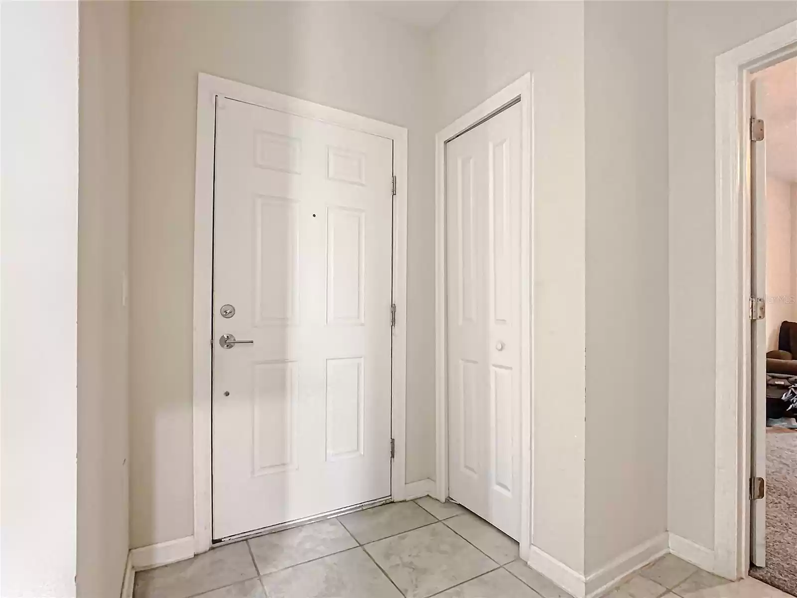 Door to garage of Left | Linen closet on right