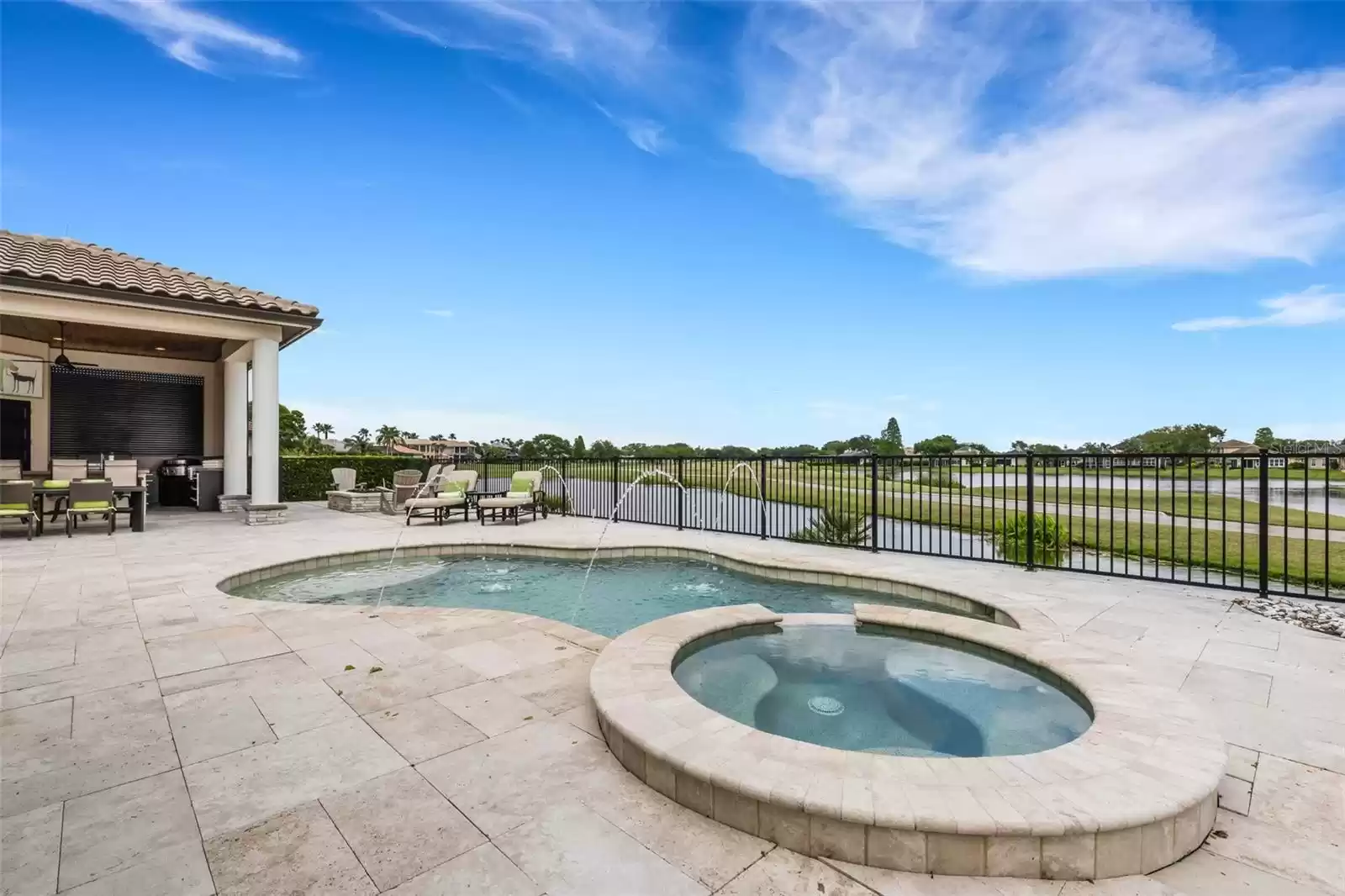 In-ground pool and spa.