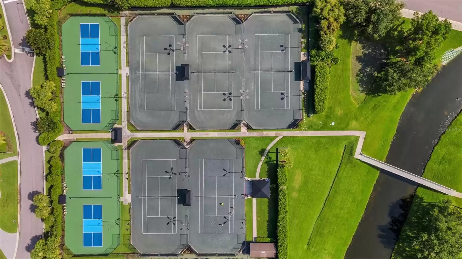 Racquet complex features 5 clay tennis courts and 4 pickleball courts