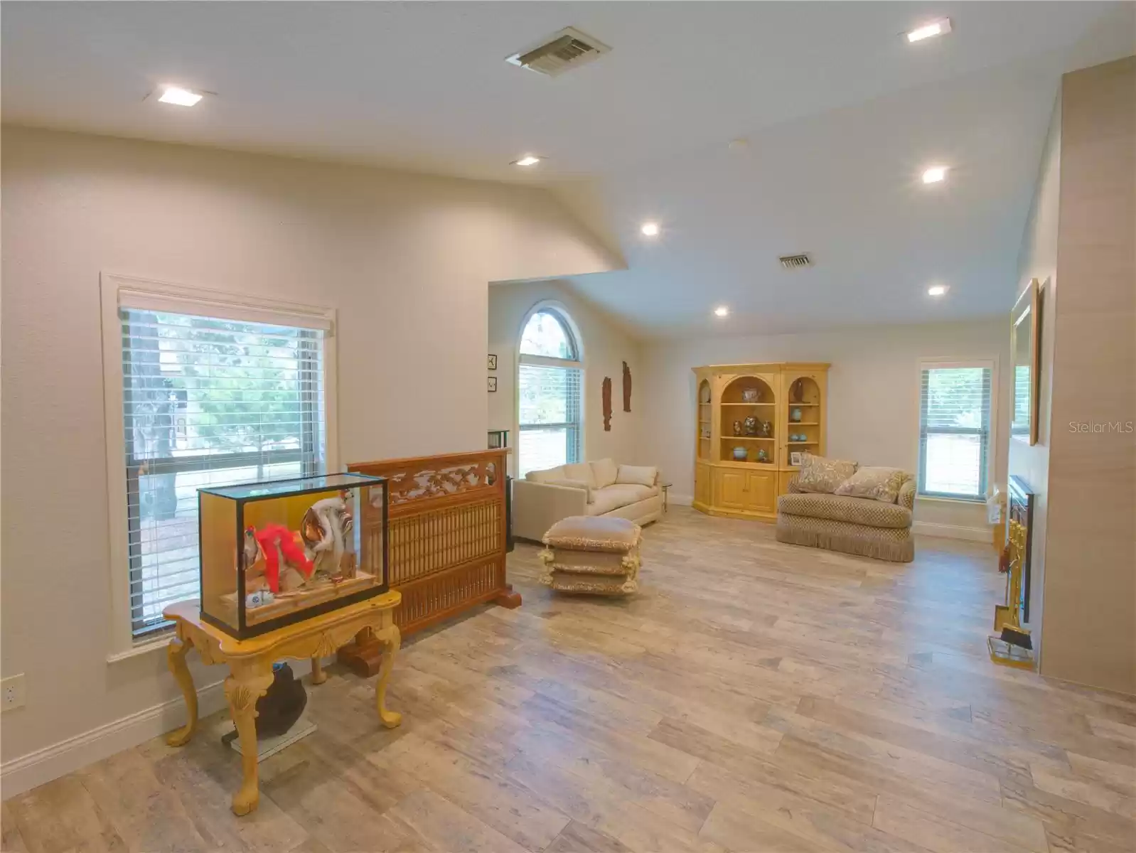 Great room with fireplace and cathedral ceilings