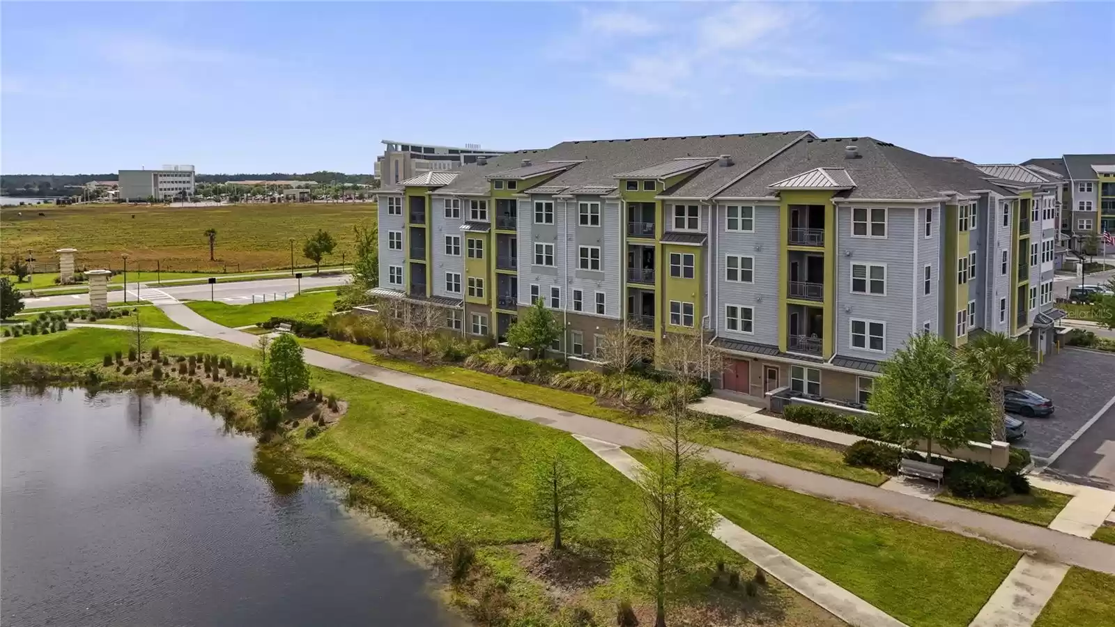 The Gatherings is a vibrant community offering an array of amenities that include a Clubhouse, fitness center, RESORT-STYLE POOL, bocce and pickleball courts, walking paths along the Lake, an outdoor pro-turf exercise area, dog parks and more!