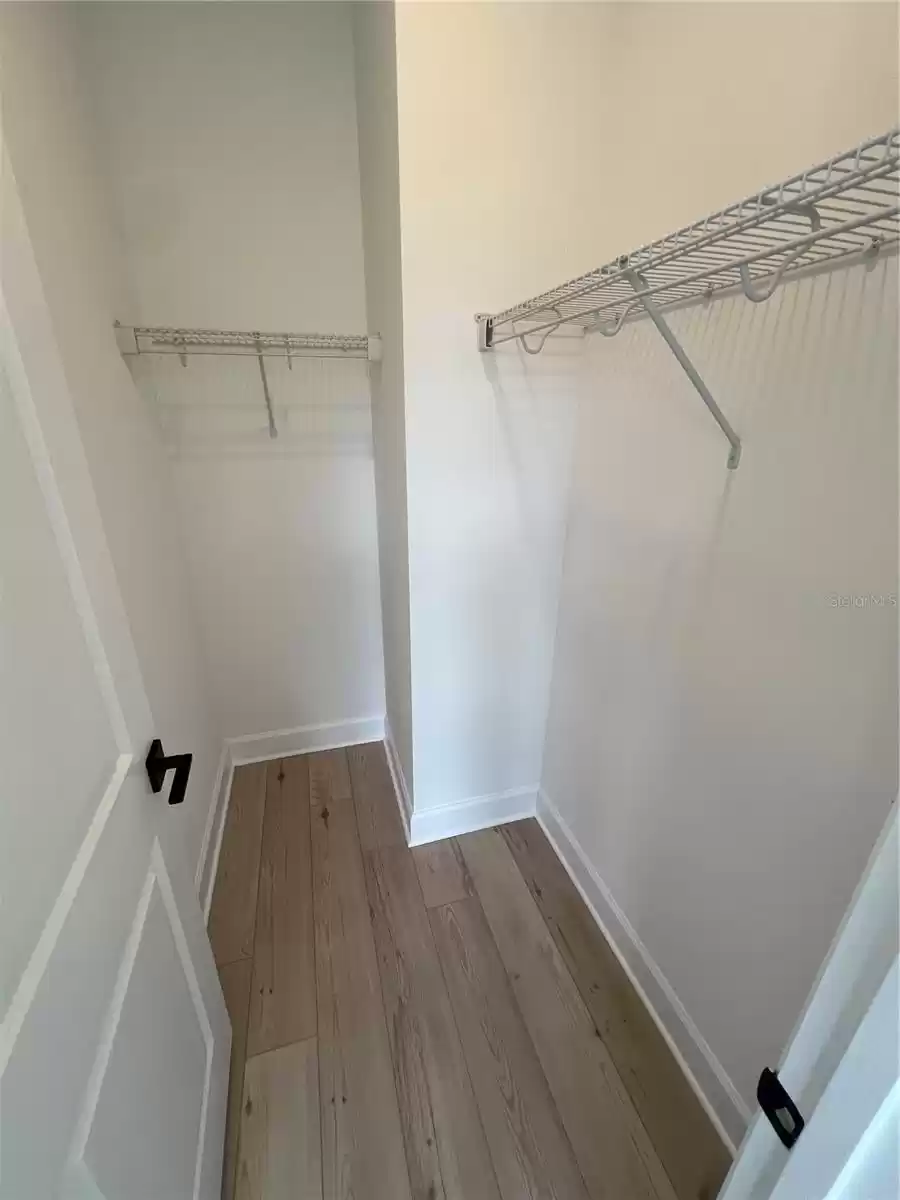 Walk-in closet for secondary bedroom