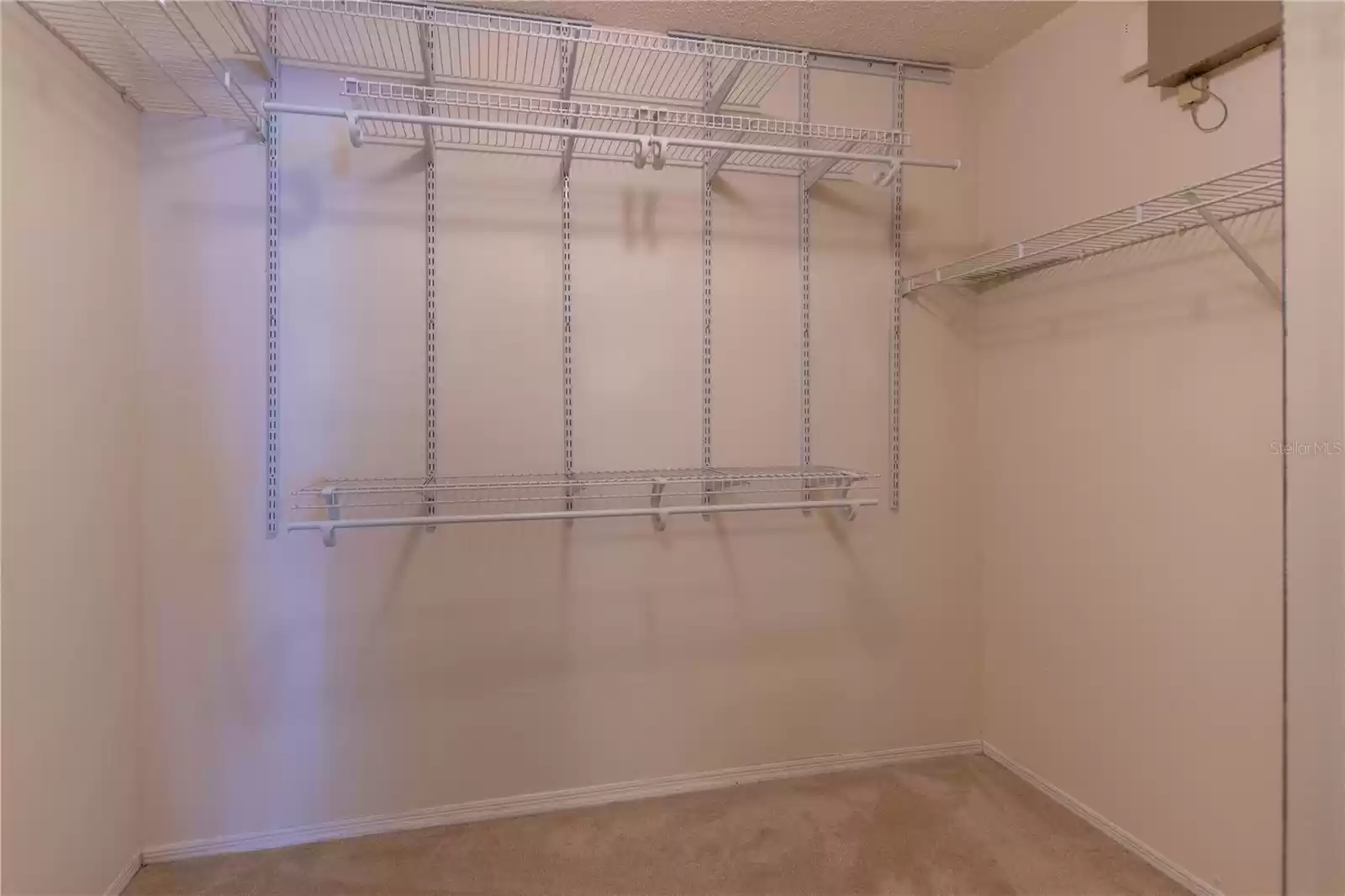 Primary bedroom walkin closet