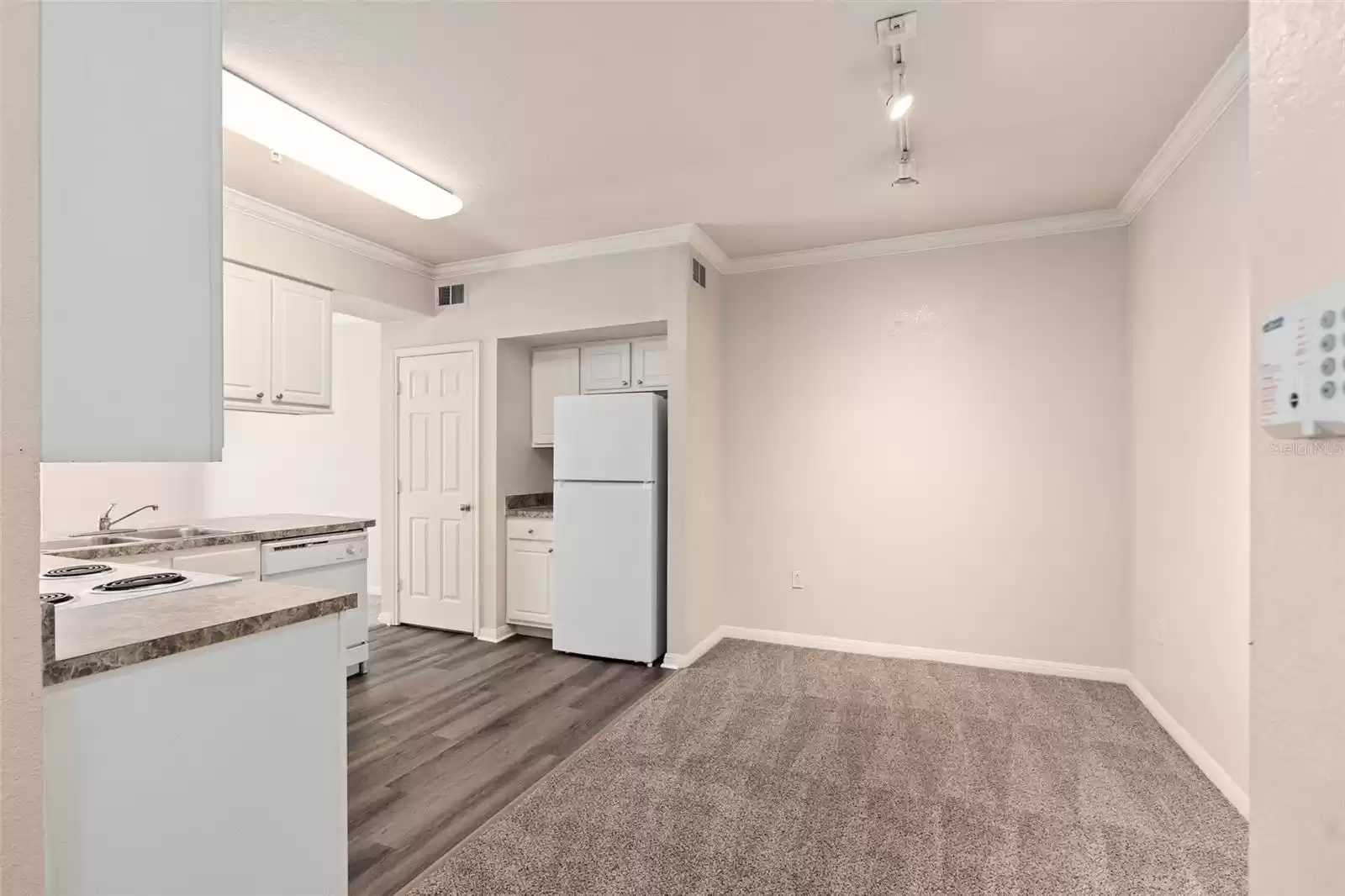 View from front door into dining area/kitchen