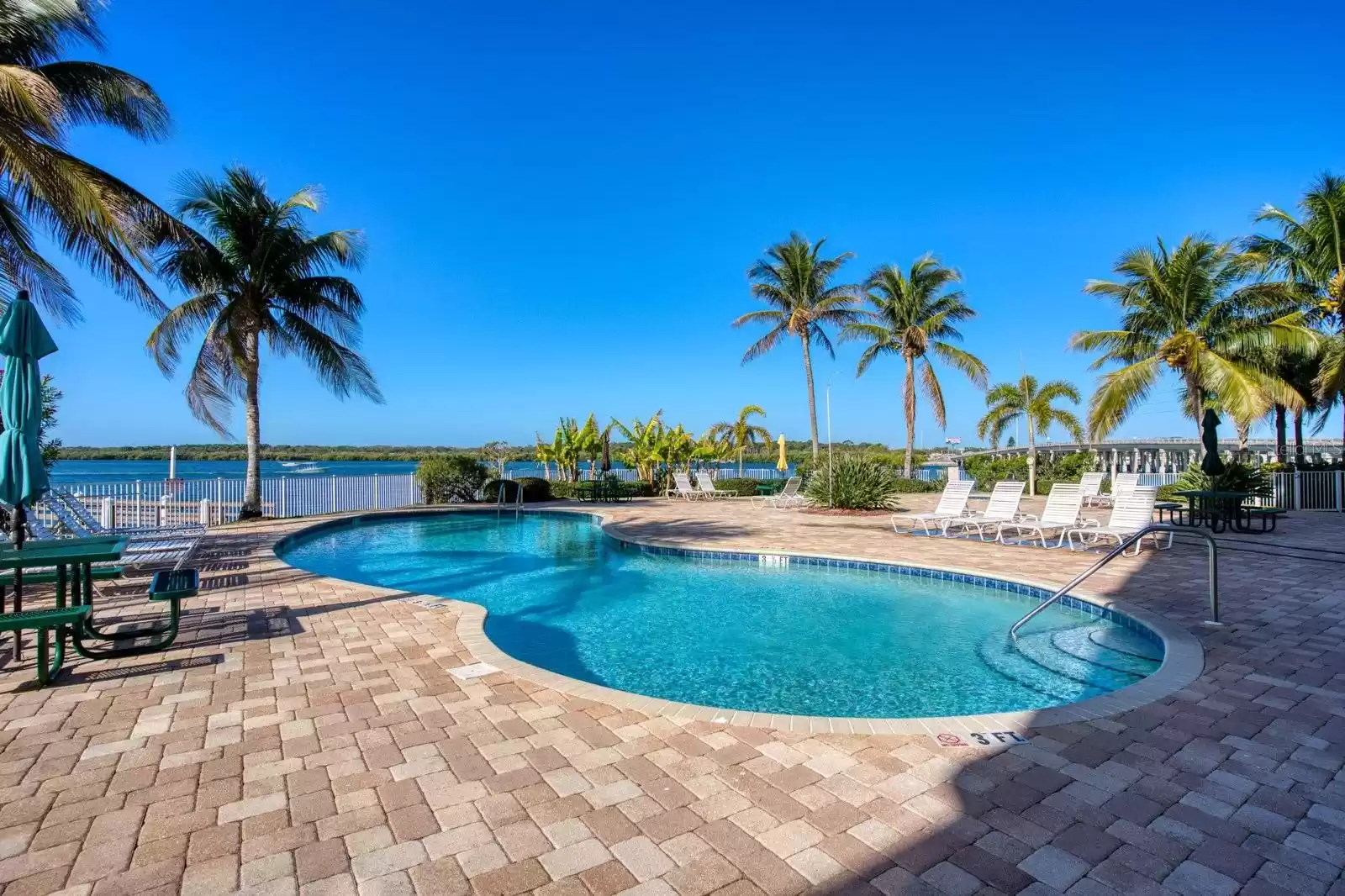 Incredible pool and hot tub right on the water!