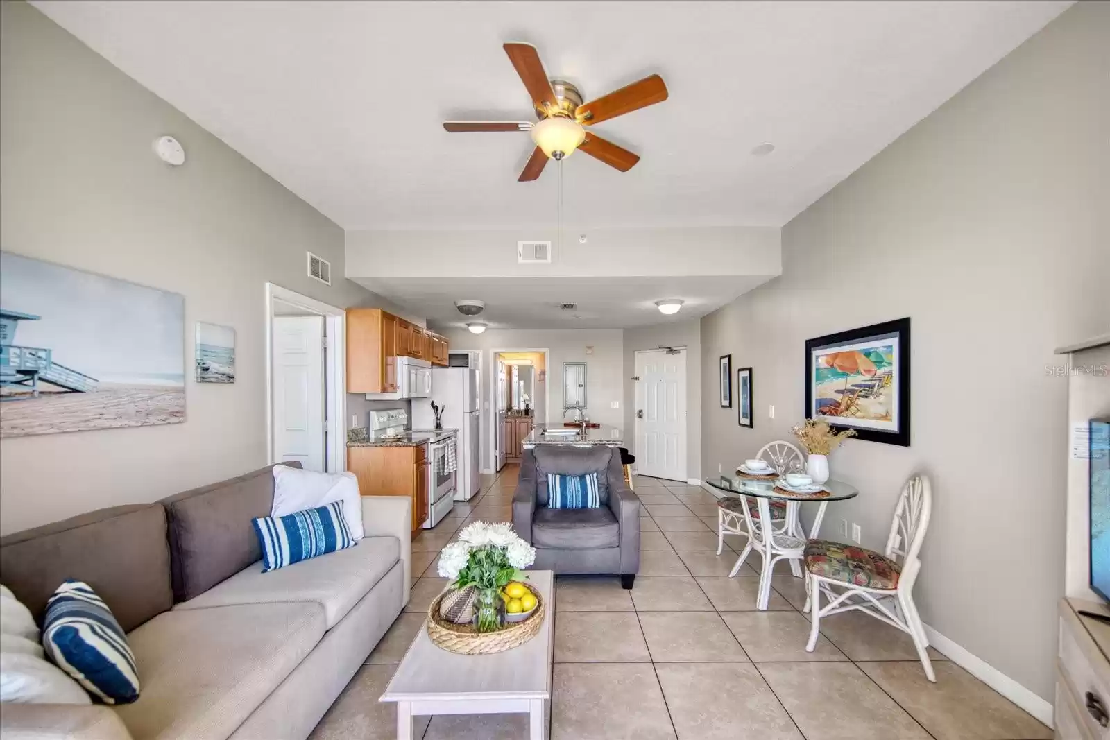 View of condo through sliders to the front door.