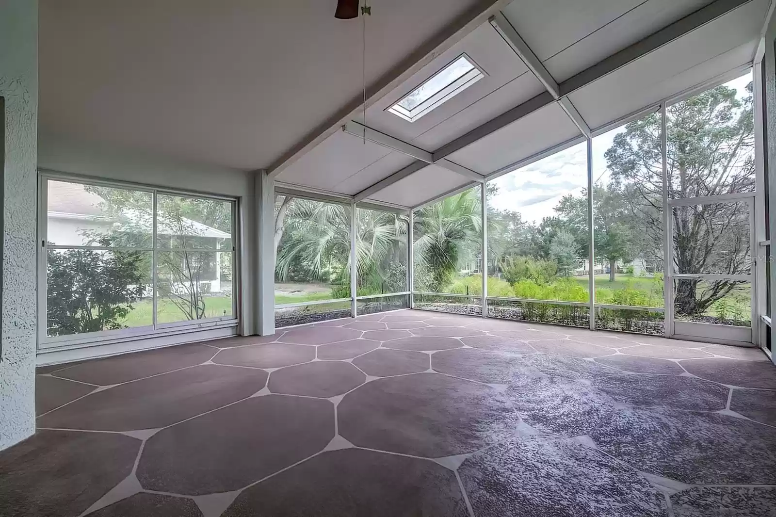 Screened-in patio with sky light