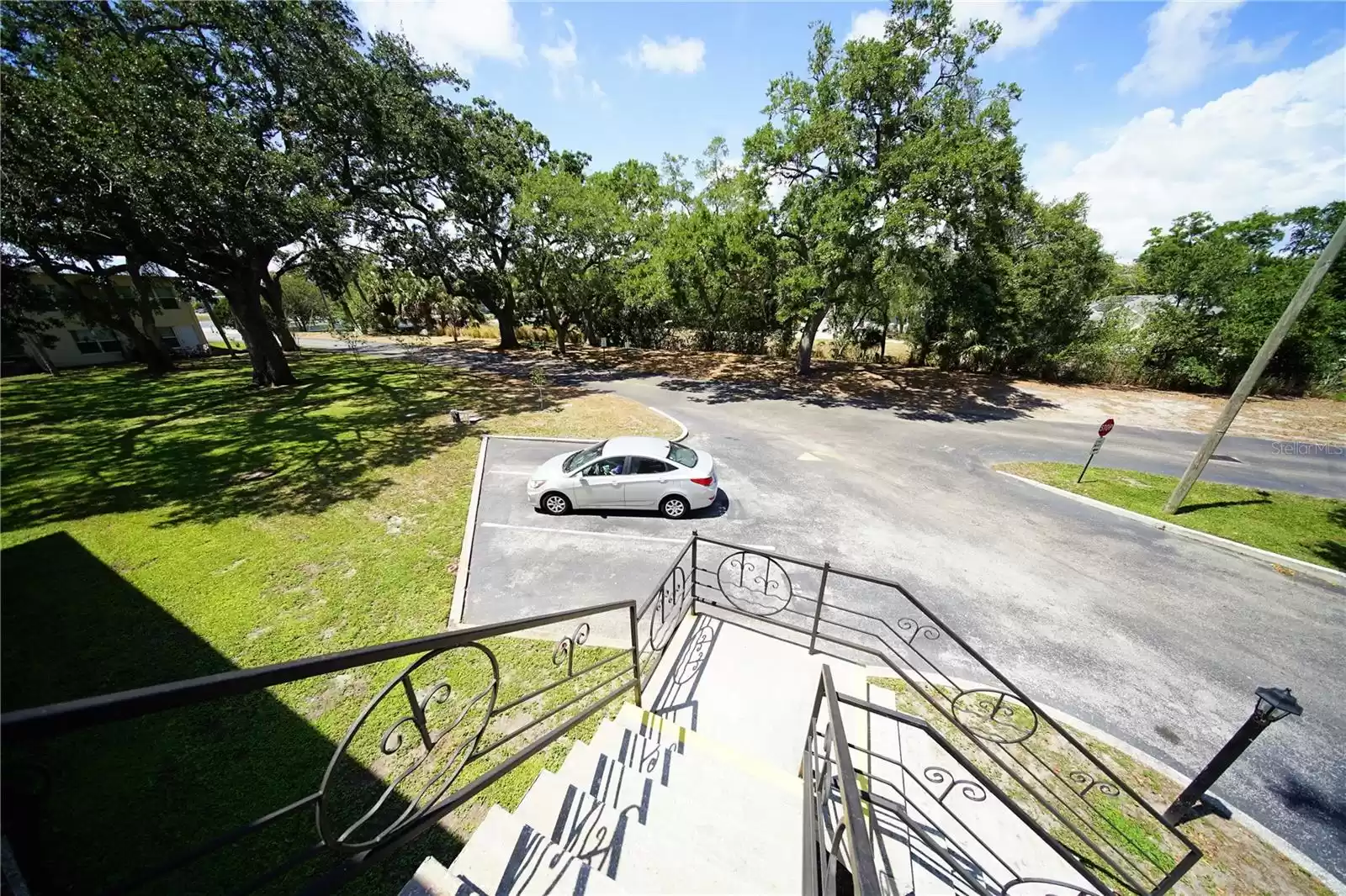 Down from the stairways you come to your assigned parking space the 1st from the stairway.