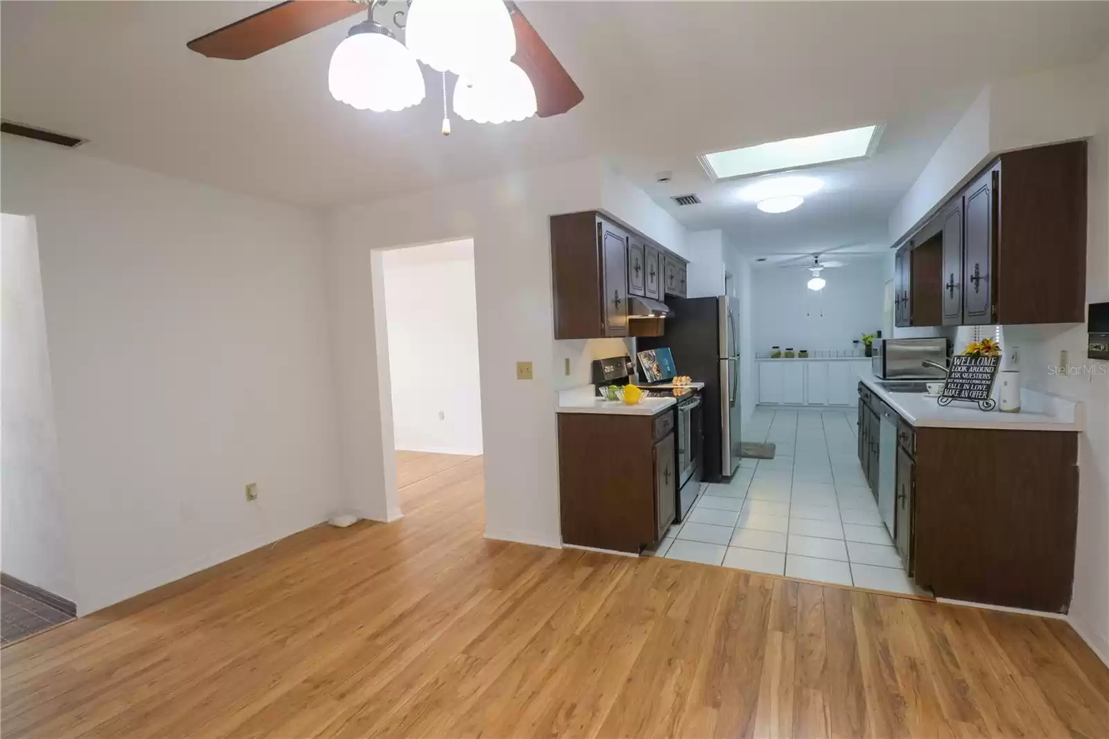 The view of the kitchen from the family room.