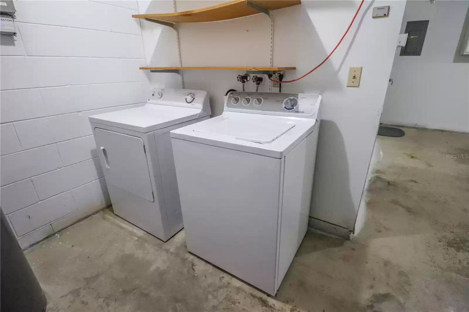 Laundry room inside the garage.