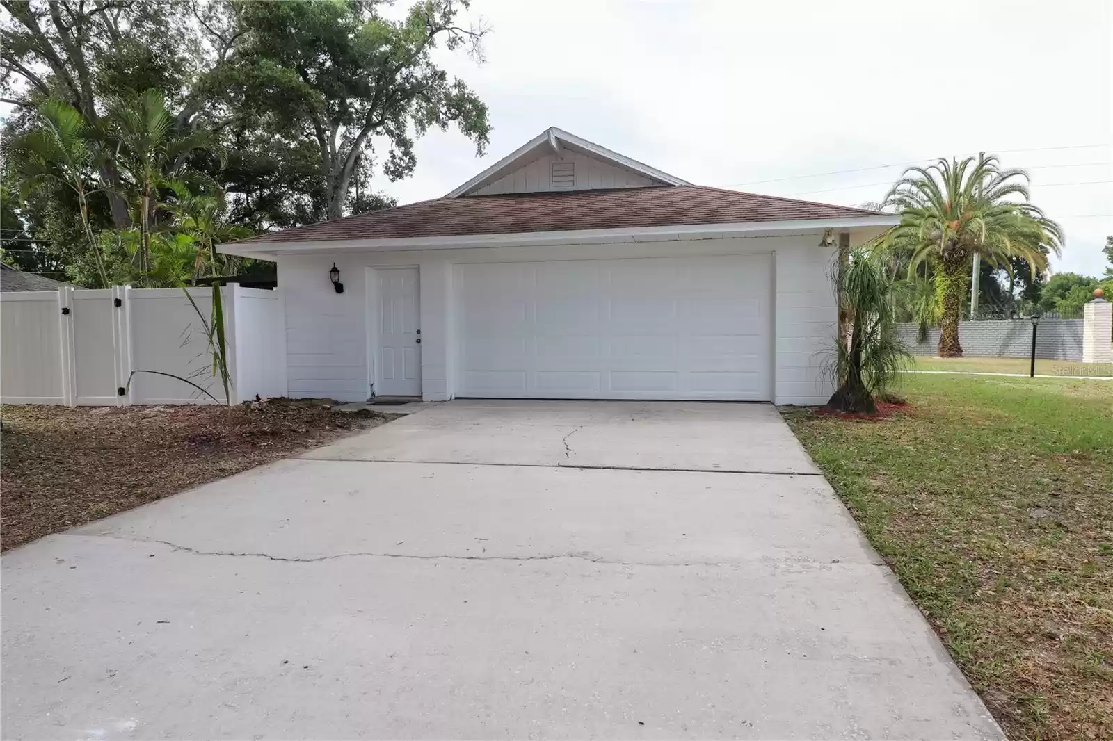 Side two car garage door.