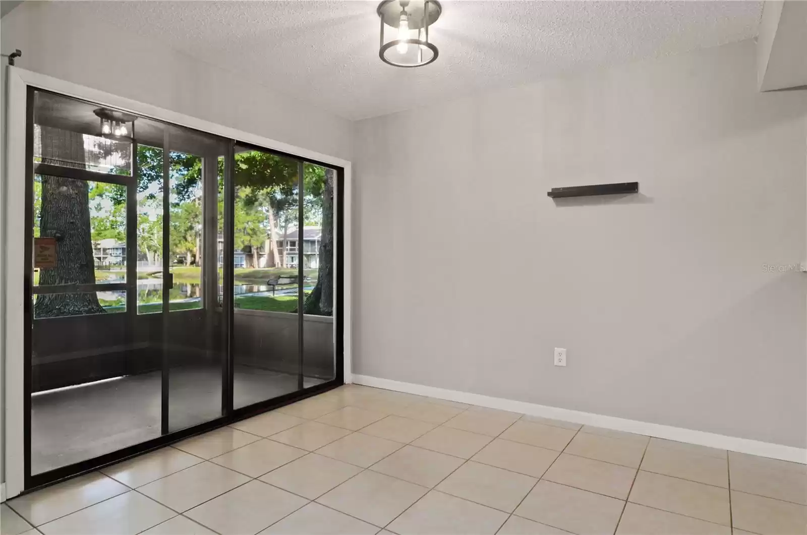 5957 WINDHOVER DRIVE, ORLANDO, Florida 32819, 2 Bedrooms Bedrooms, ,2 BathroomsBathrooms,Residential,For Sale,WINDHOVER,MFRO6202006