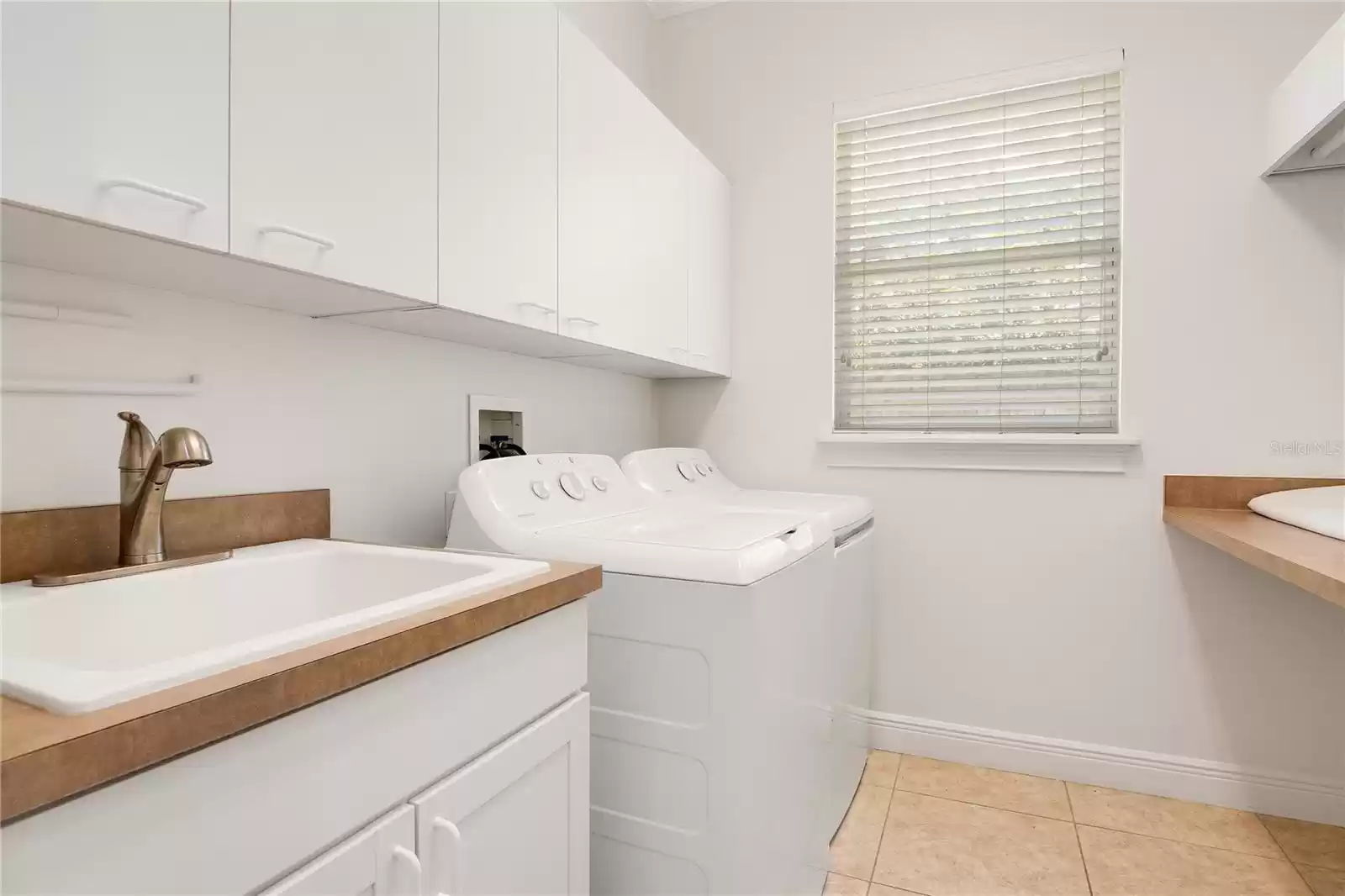 Laundry room just off of the kitchen.