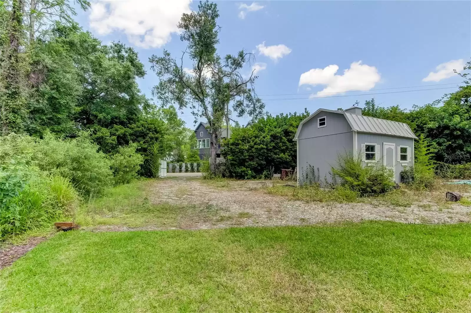 Storage shed and utility entrance to the property